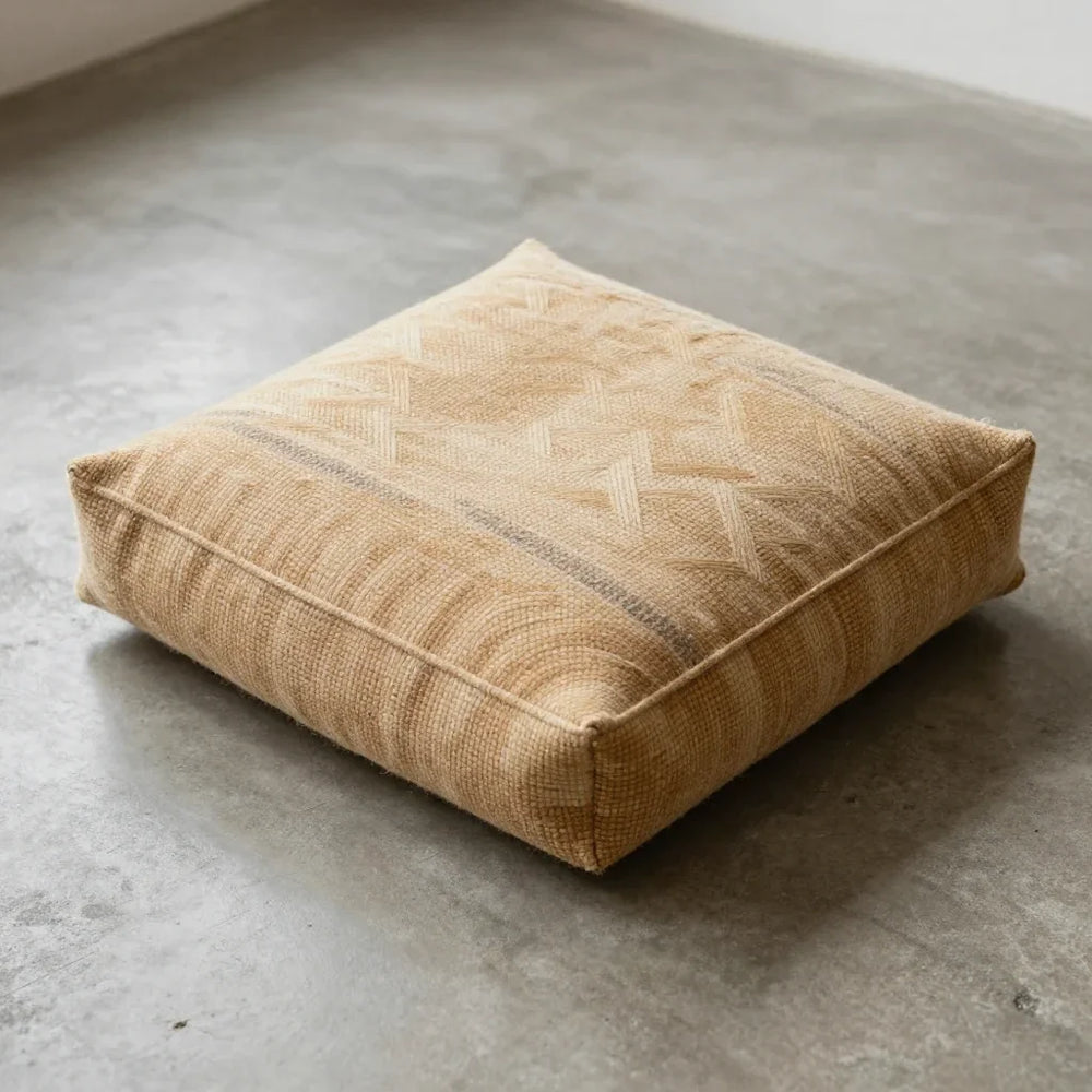 Kaden Floor Cushion by ALPORA, a low floor cushion with tibetan kaden weaving structure, natural undyed wool, ergonomic adaptation of a traditional seat
